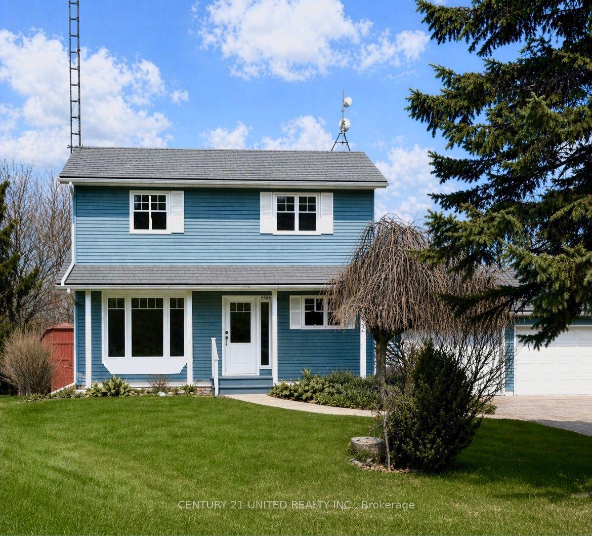 9588 Ardagh Crescent — photo 1
