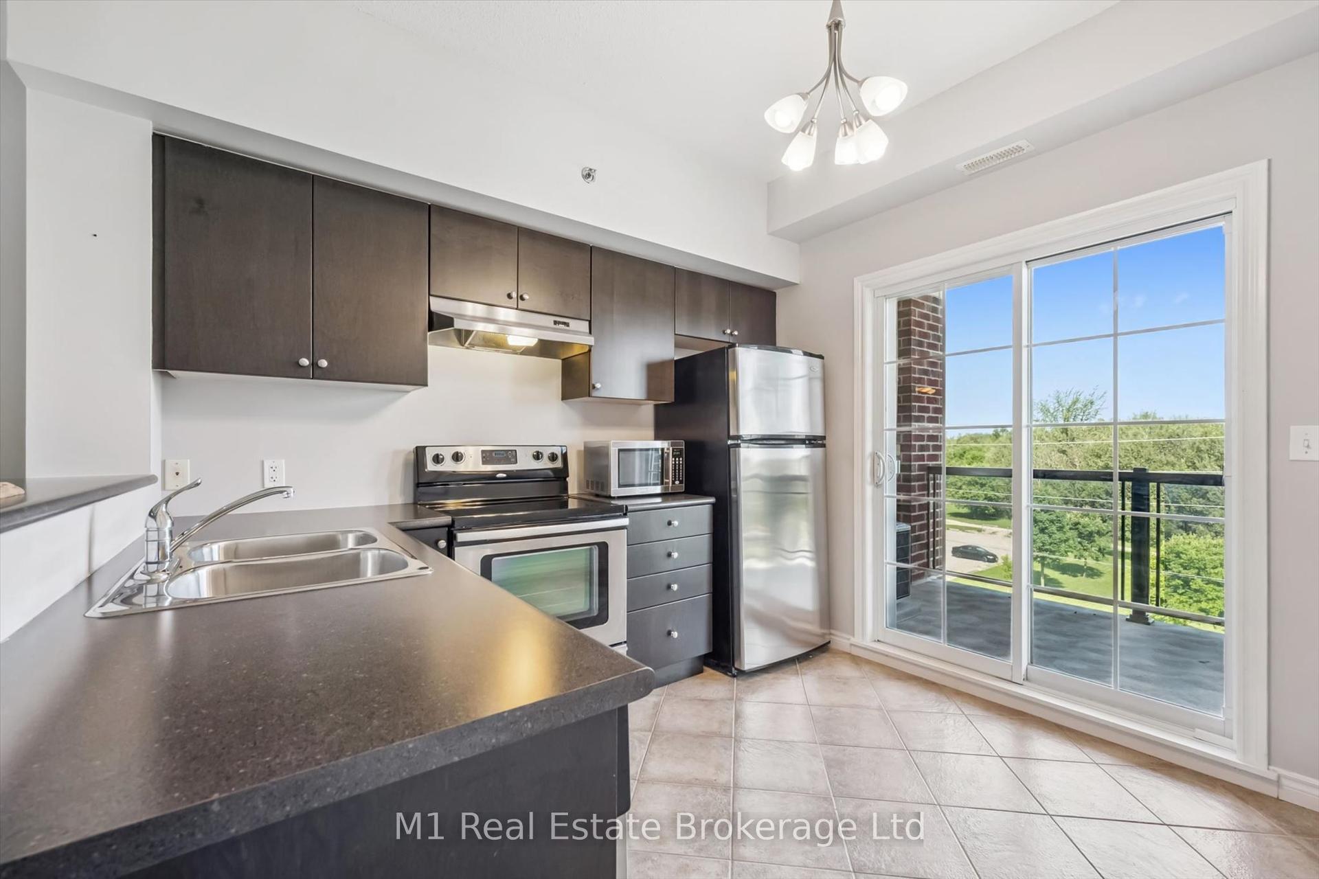 308 Watson Parkway N 412 #412, Guelph — Condo for sale, photo 1