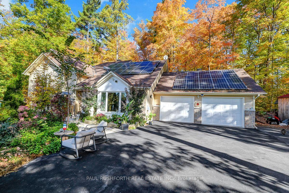 712 Flat Rapids Road — photo 1