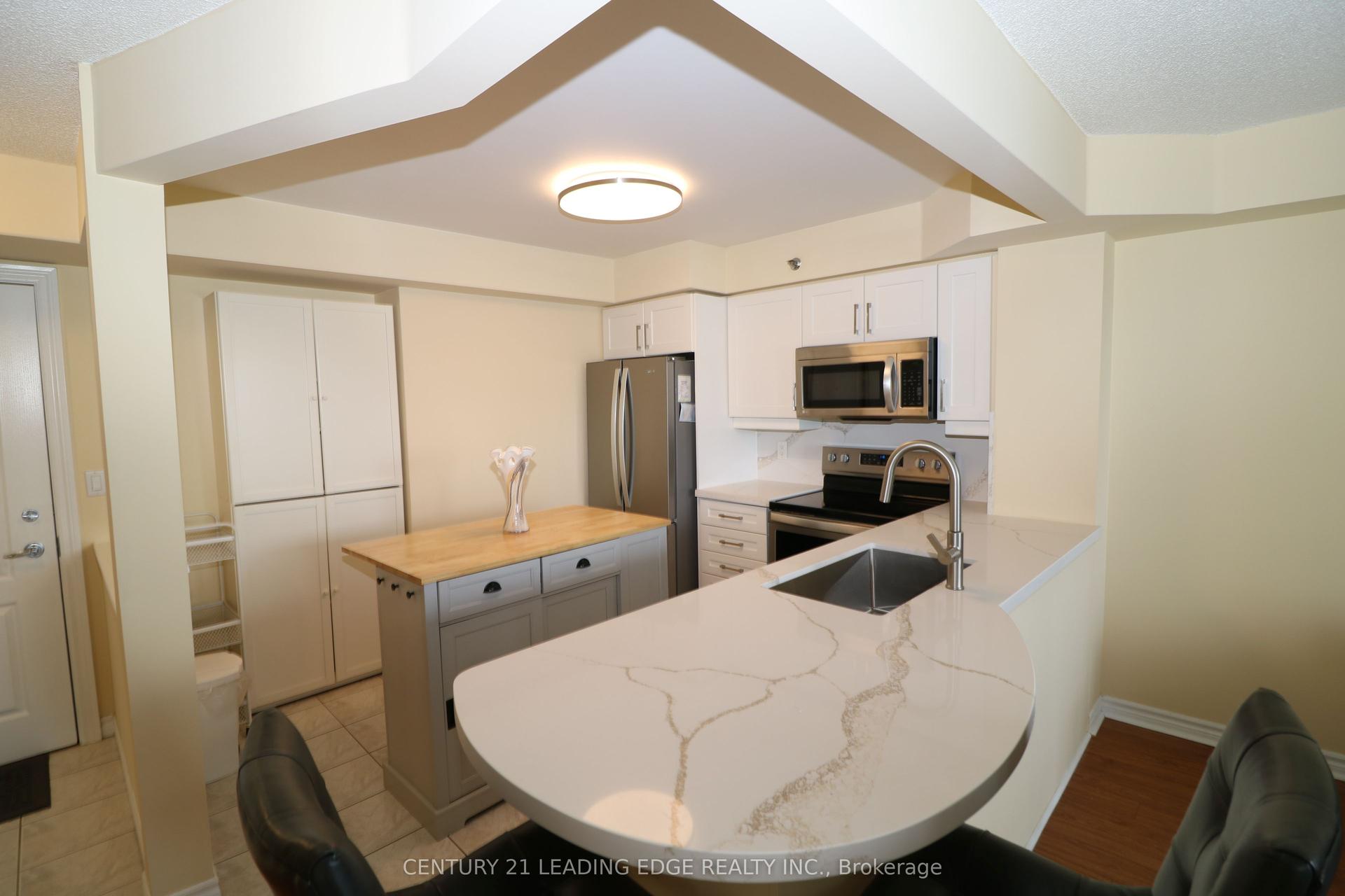 4640 Kimbermount Avenue 305 #305 — photo 1