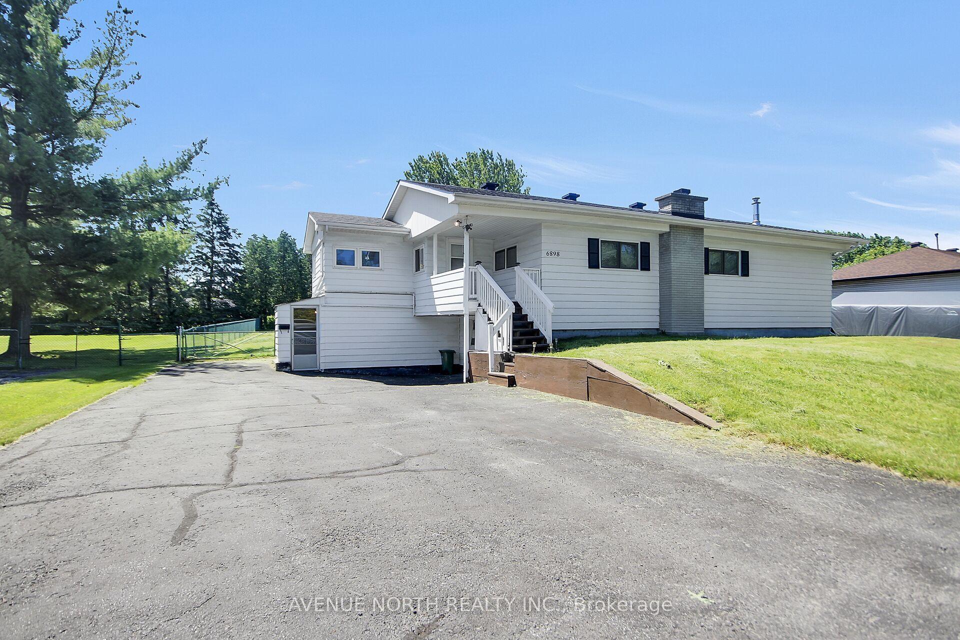 6898 Mitch Owens Road — photo 1