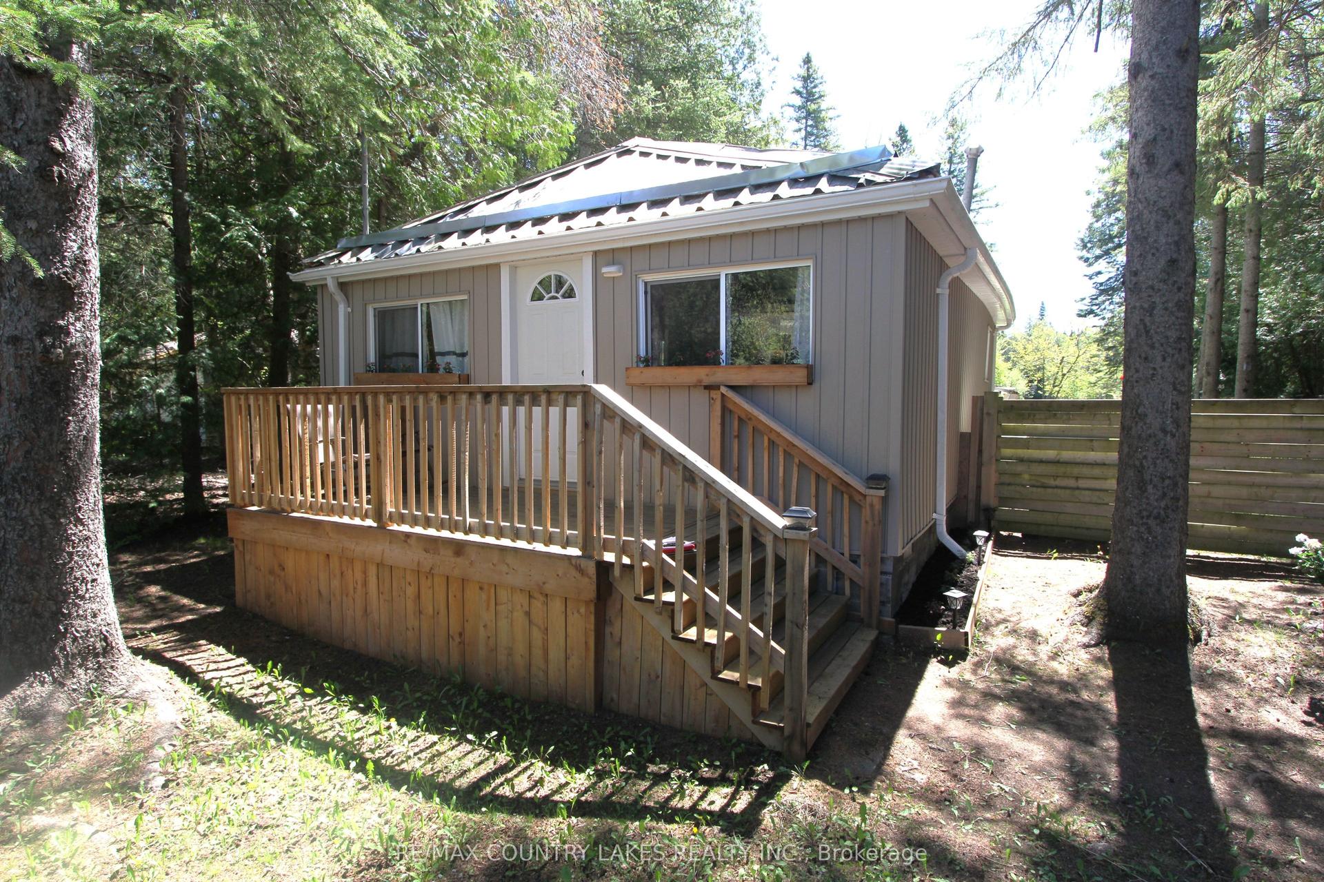 77 McGuire Beach Road, Kawartha Lakes — Detached for sale, photo 1