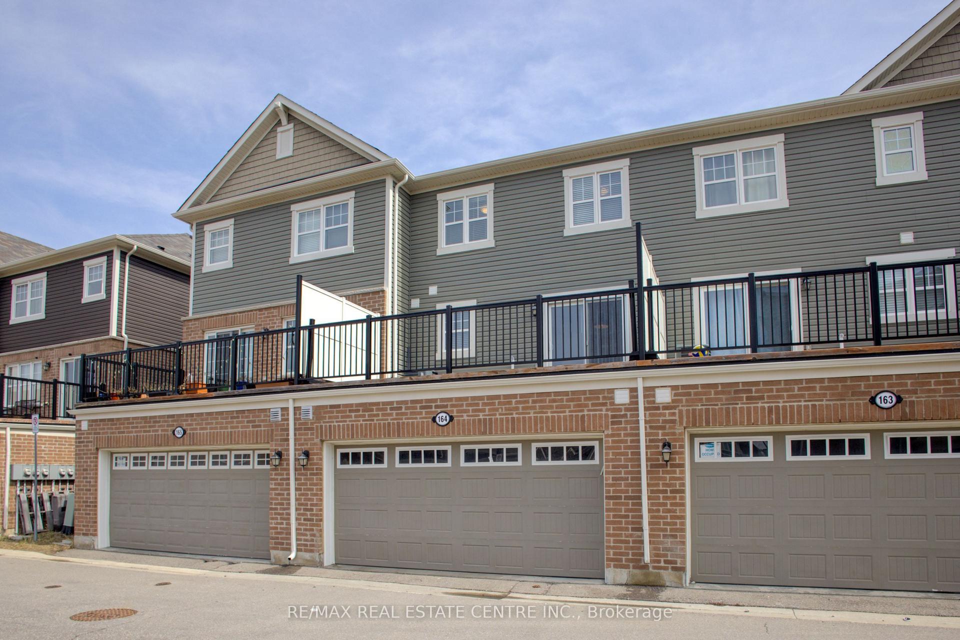 1000 Asleton Boulevard 164 #164, Milton — Townhouse for sale, photo 1