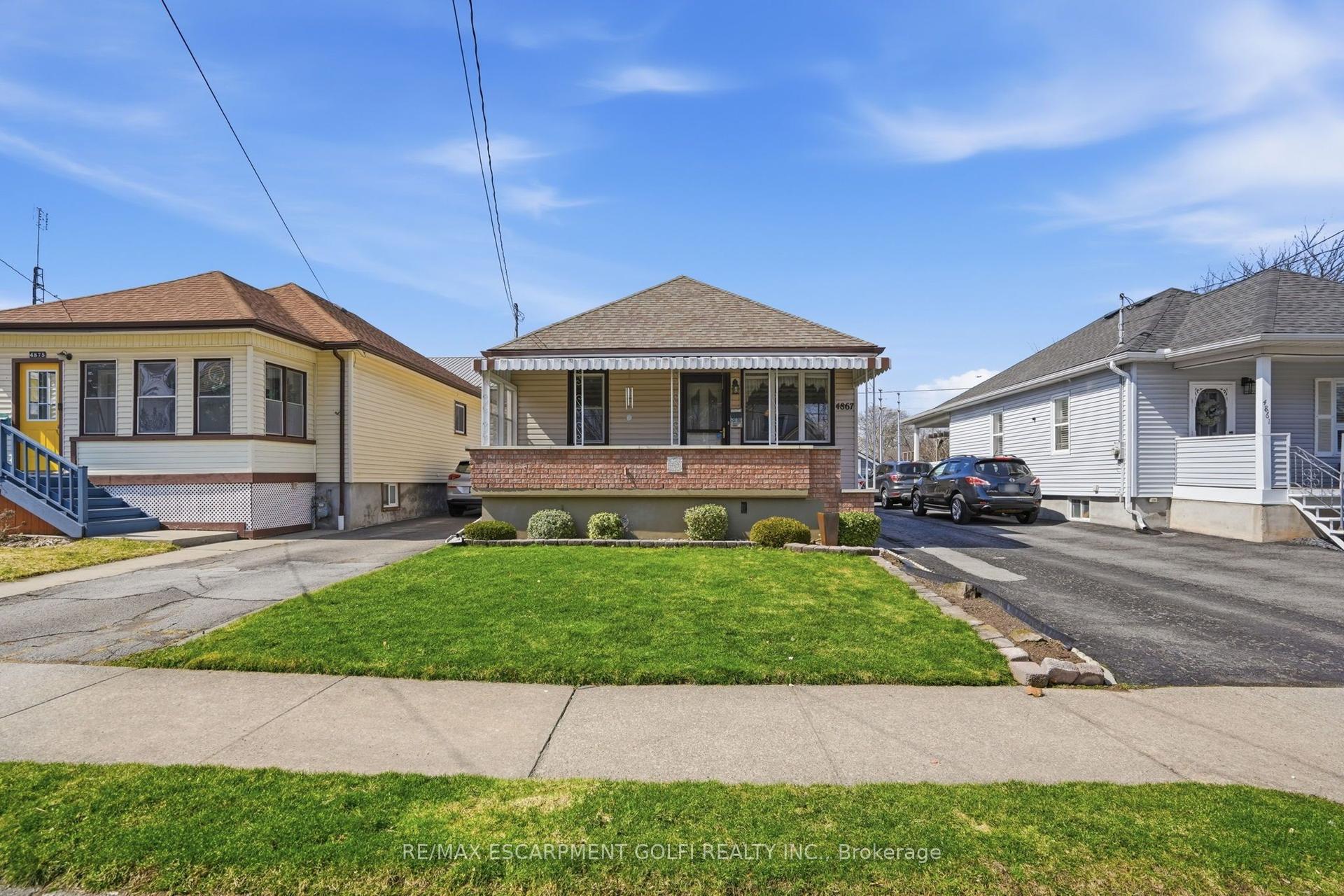 4867 SIXTH Avenue — photo 1