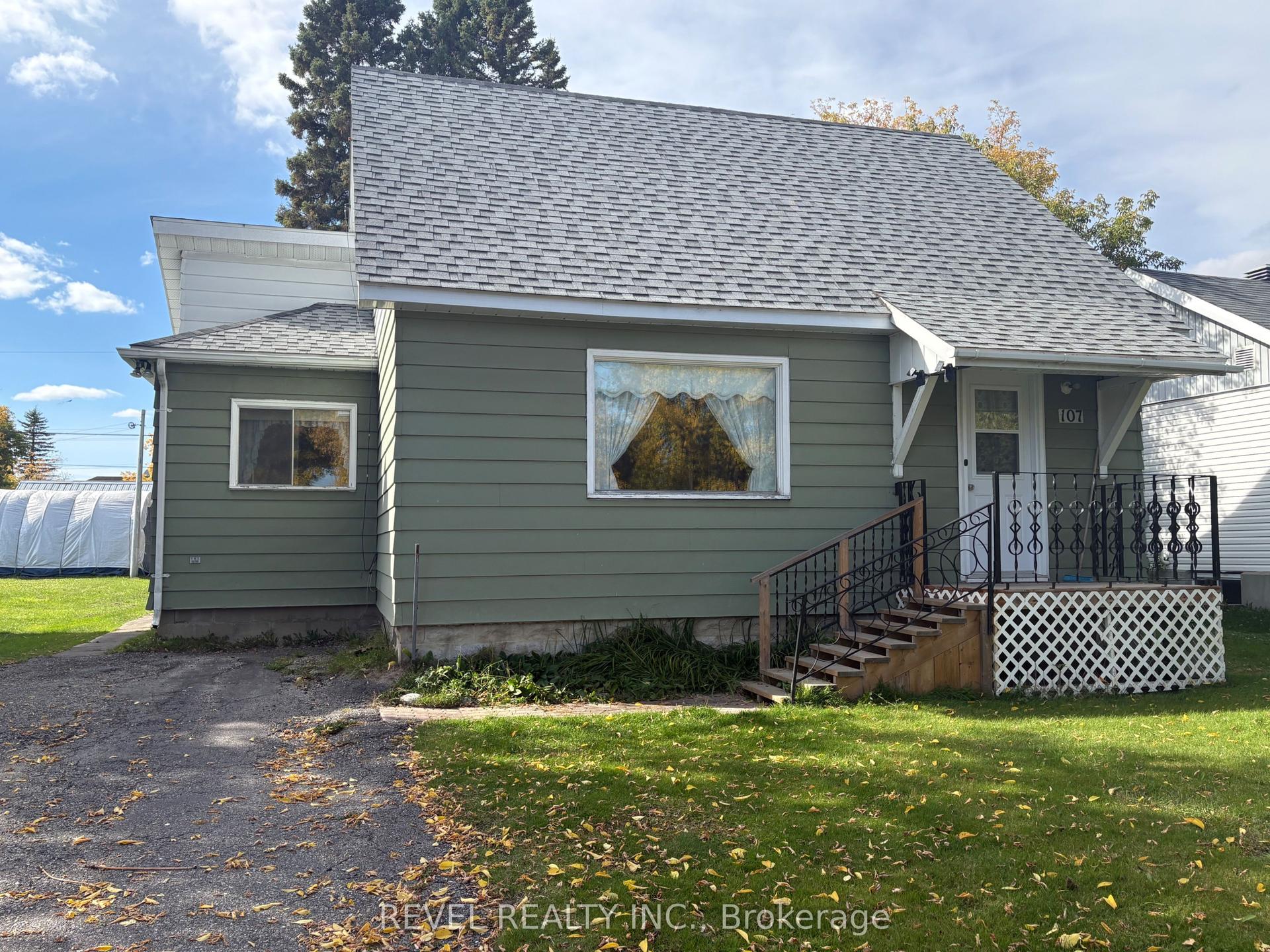 107 Fifteenth Avenue, Cochrane — Detached for sale, photo 1