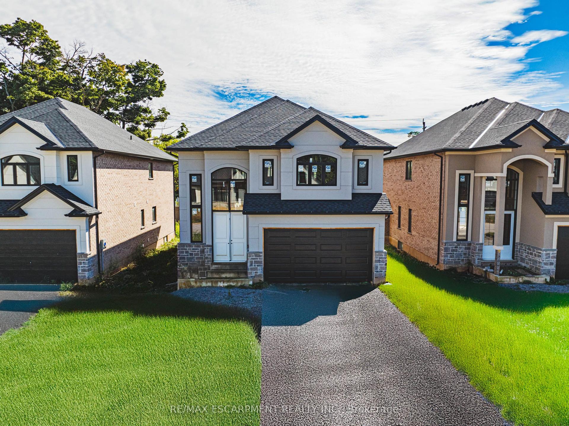 40 CESAR Place — photo 1