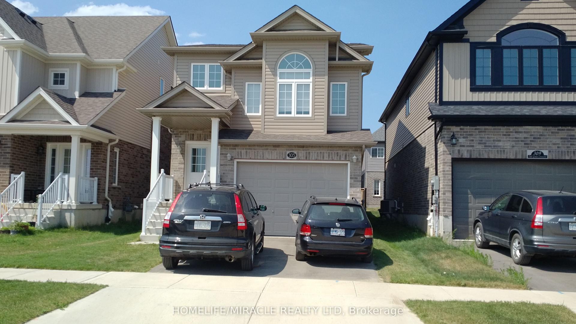 305 Tall Grass Crescent — photo 1