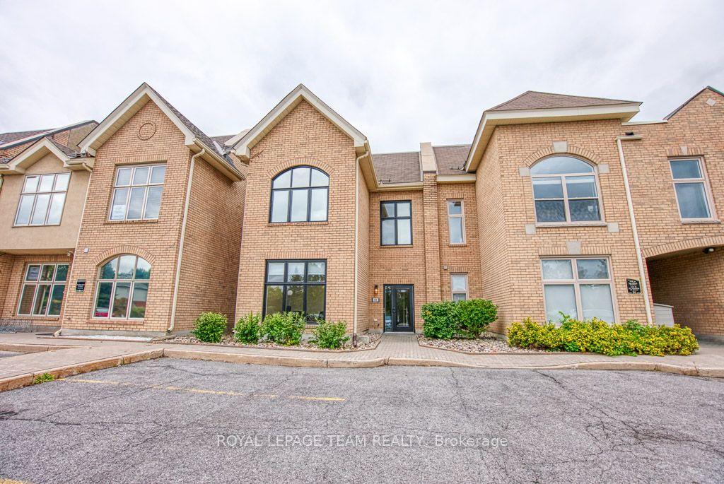 84 Centrepointe Drive — photo 1