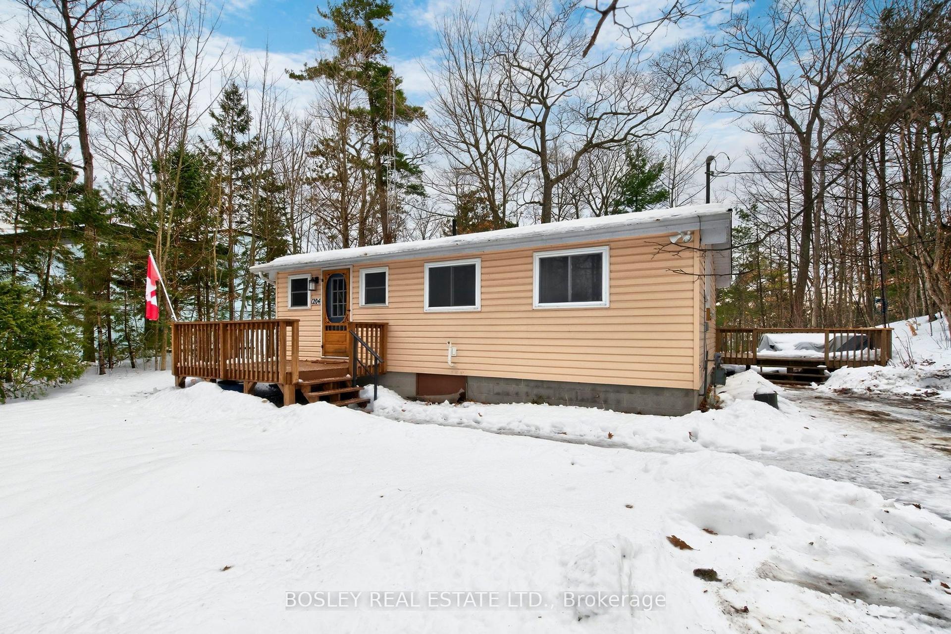 1204 Tiny Beaches Road N — photo 1