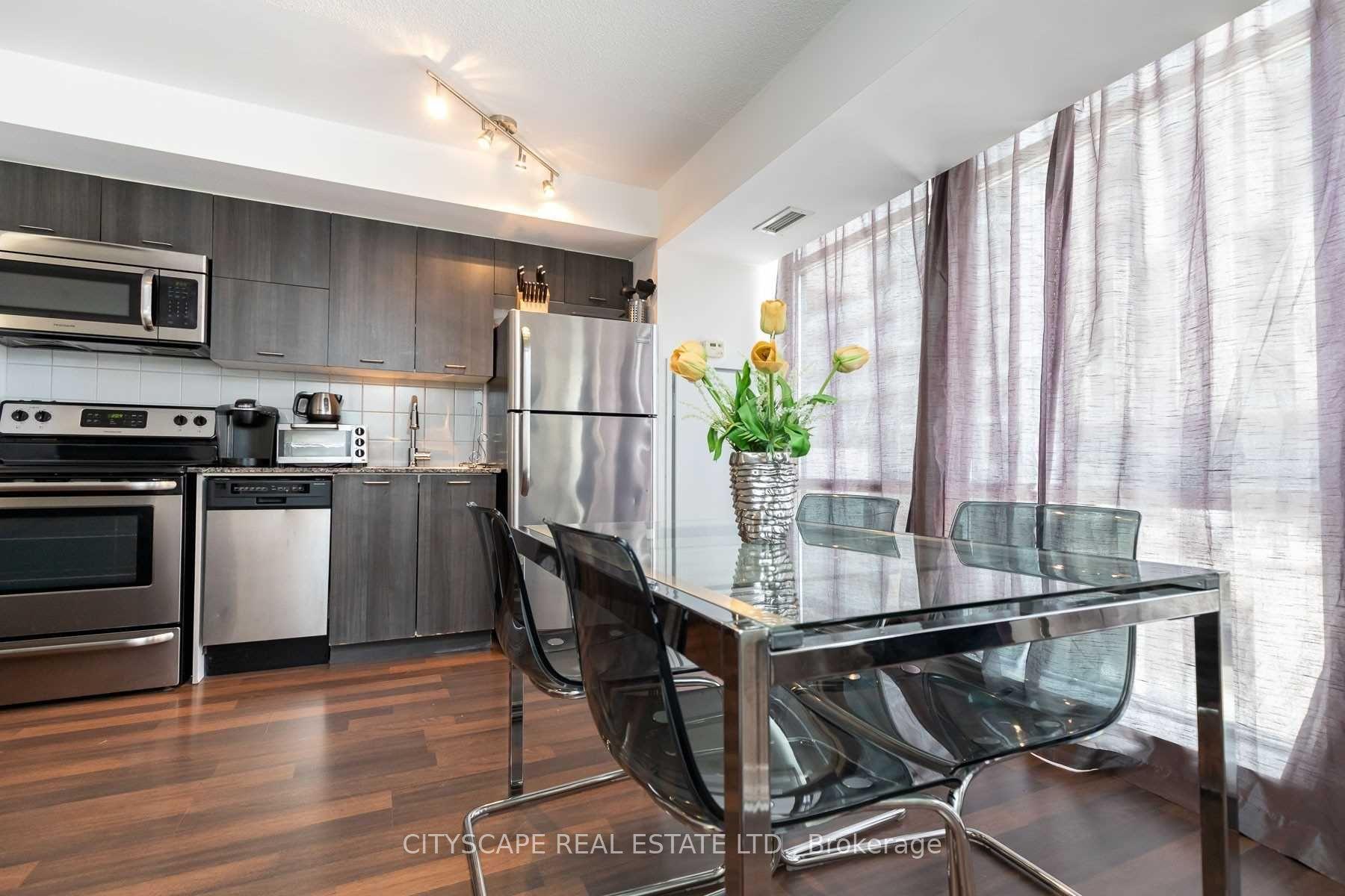 20 Joe Shuster Way 211 #211 — photo 1