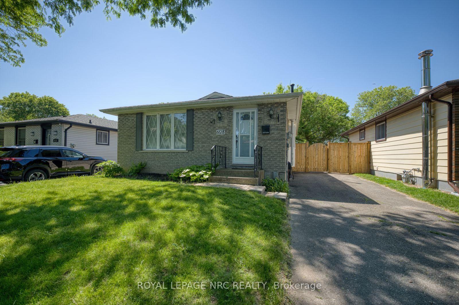 6128 STROHAN Street — photo 1