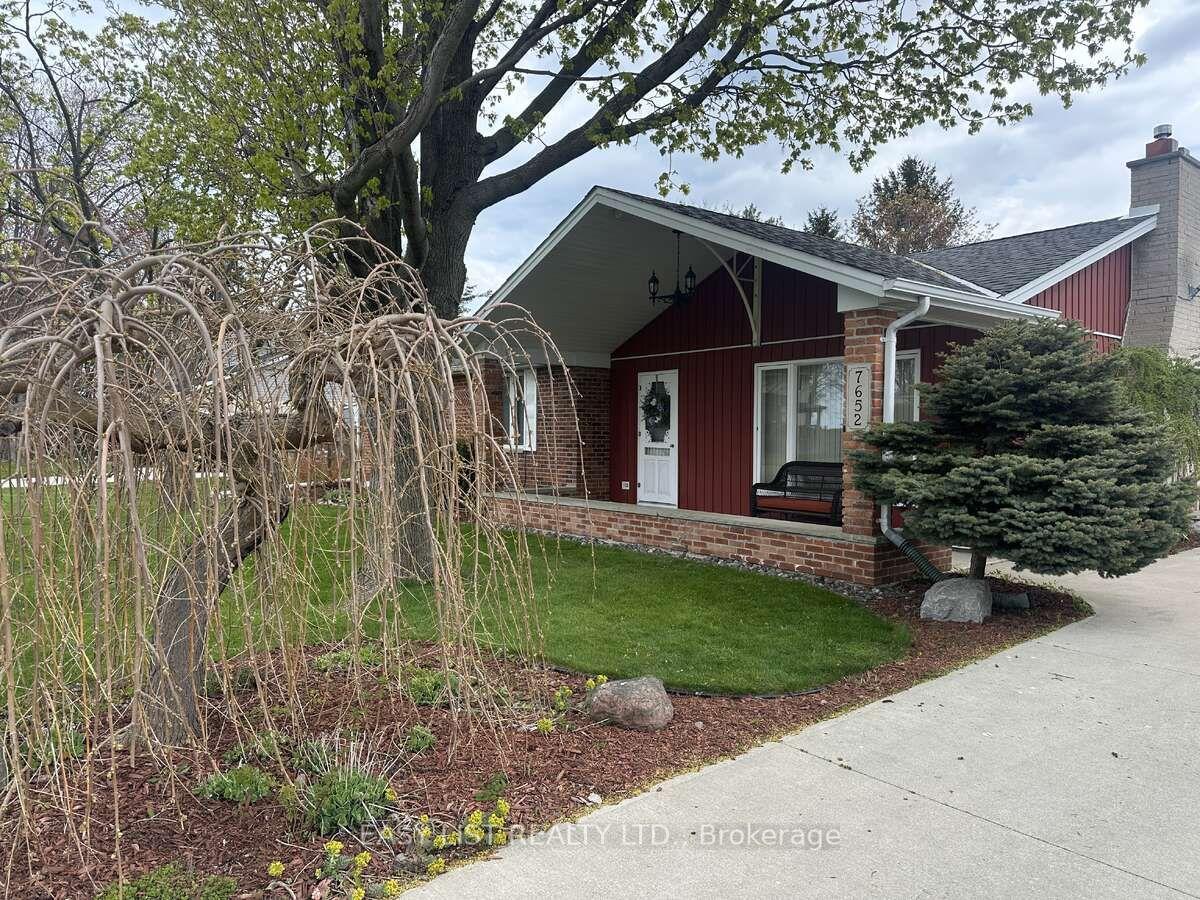 7652 Harris Point Drive — photo 1