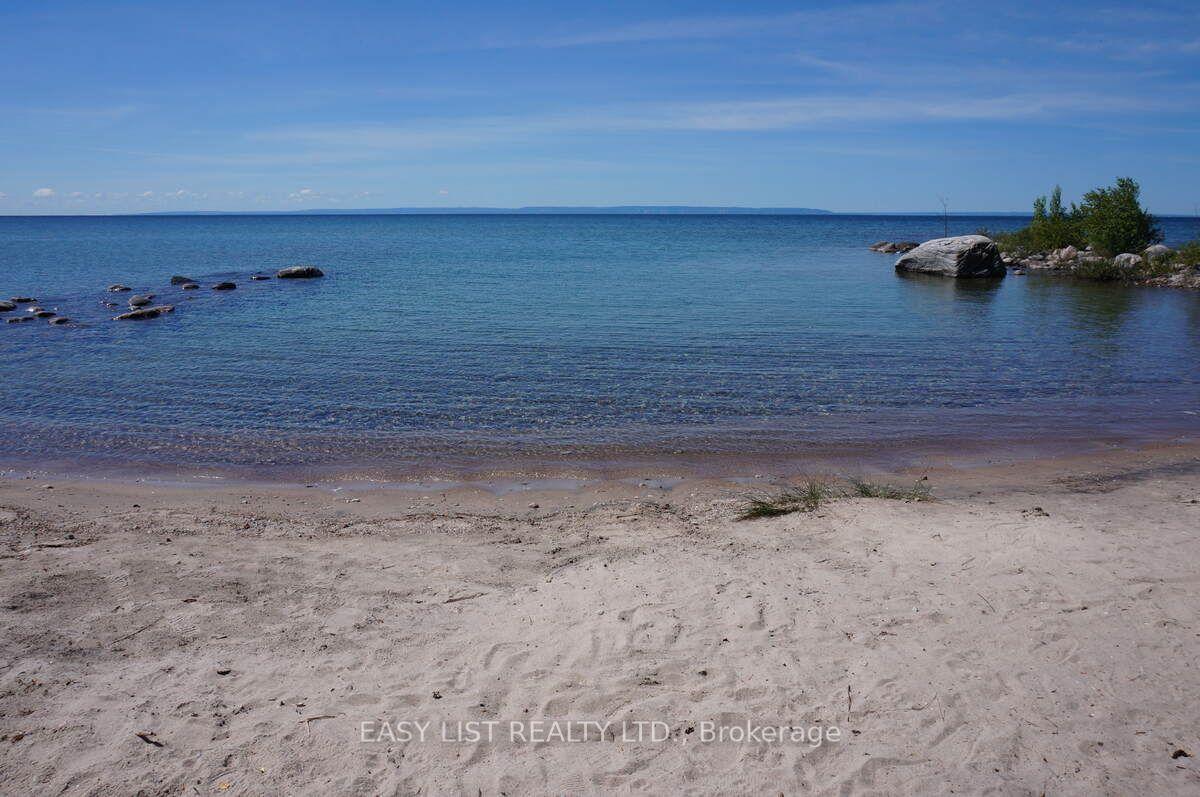 1536 Tiny Beaches Road N — photo 1