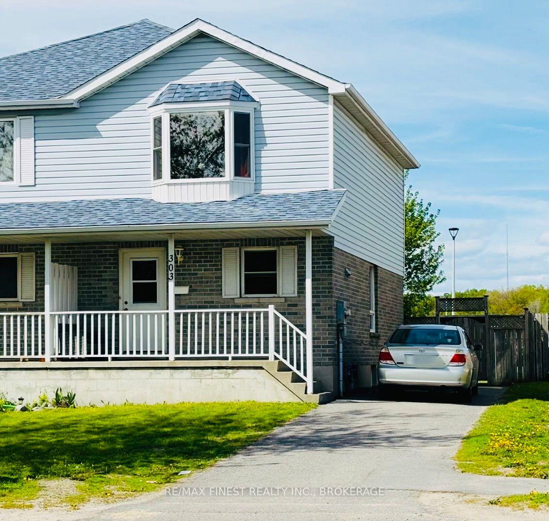303 Conacher Drive — photo 1