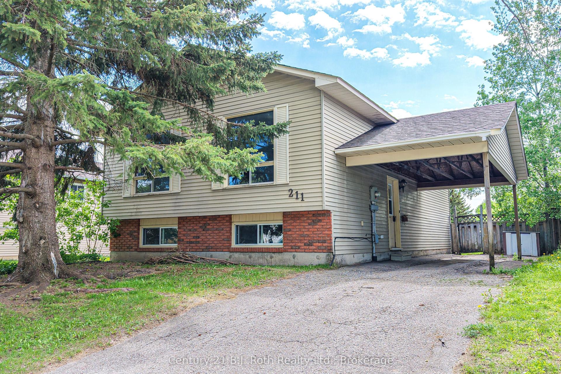 211 Westmount Drive S — photo 1