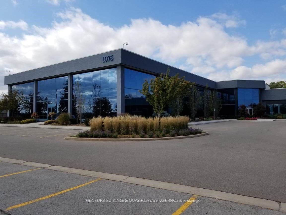 1075 North Service Road W 107-108 #107-108 — photo 1