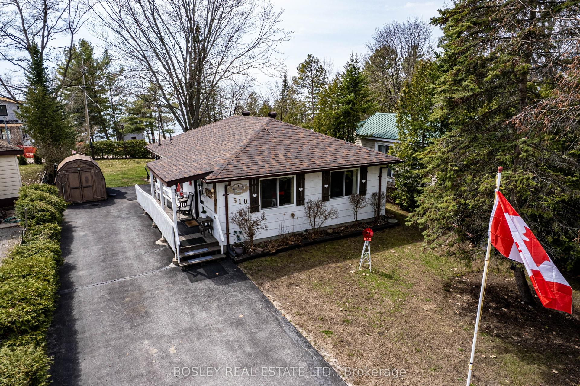 310 Tiny Beaches Road S — photo 1