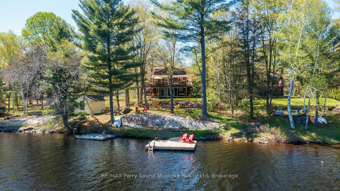 13 PENINSULA SHORES Road E — photo 1