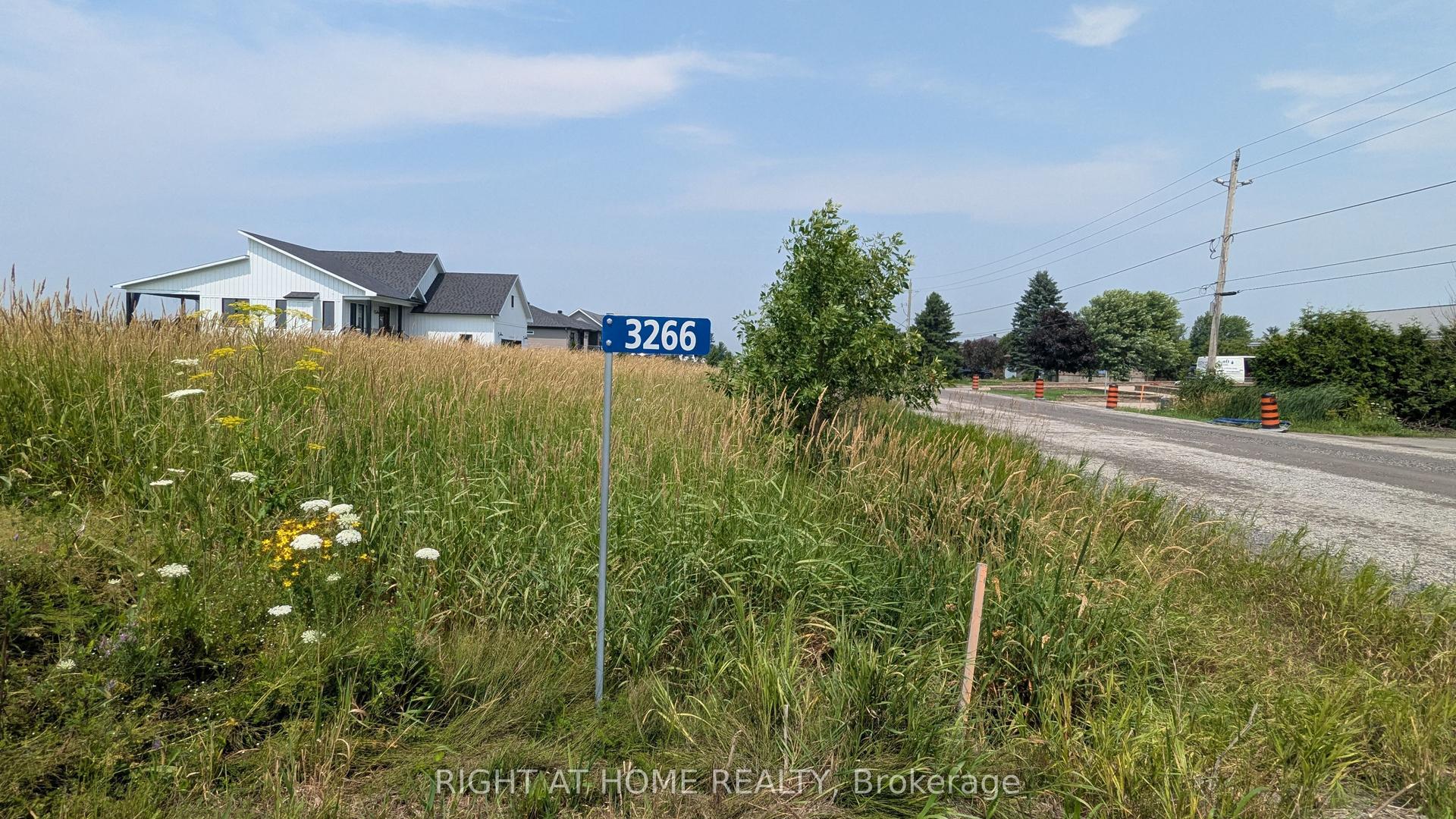 3266 SARSFIELD Road N — photo 1