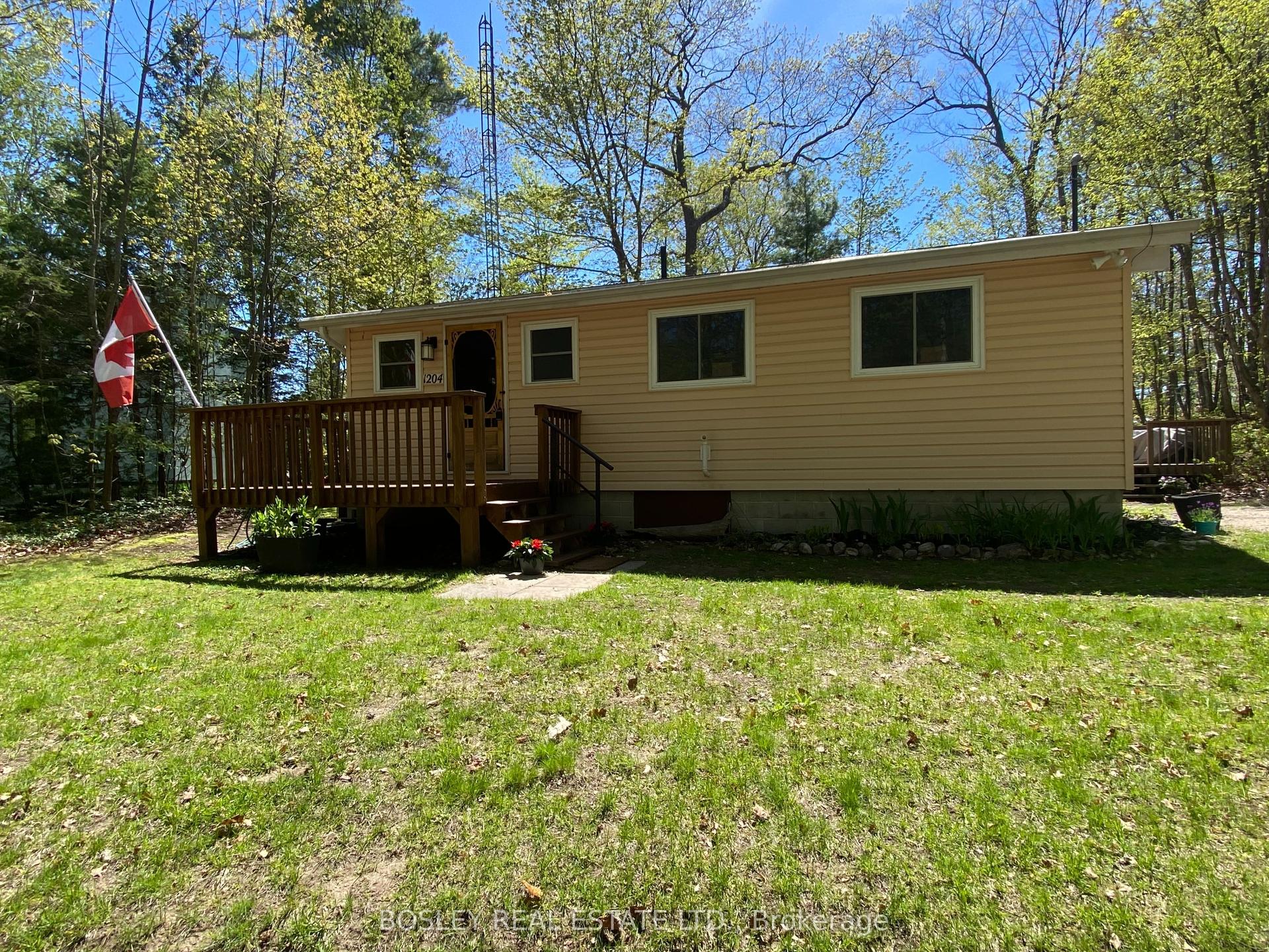 1204 Tiny Beaches Road N — photo 1