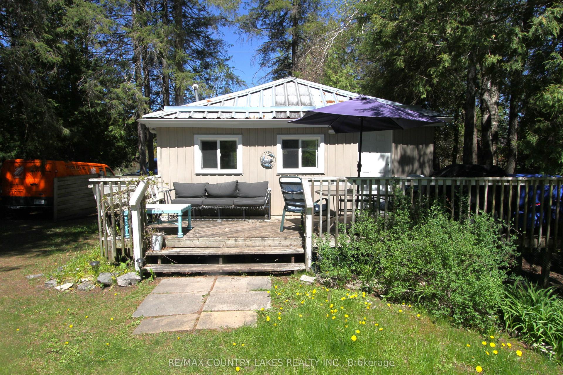 77 McGuire Beach Road — photo 1