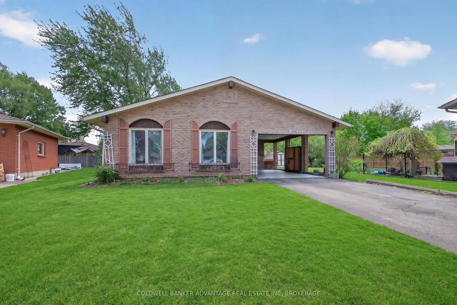 6976 ABBEY Circle — photo 1