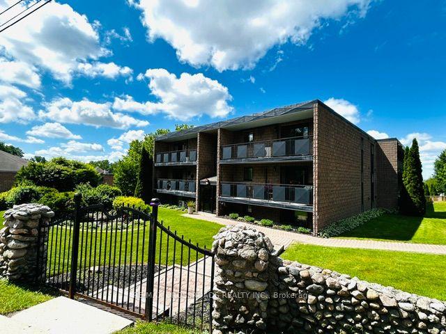 74 The Queensway South Road 106 #106, Georgina — Condo for sale, photo 1